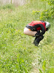 Photo 1, Biker woman pissing