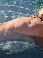 Wife in pool on